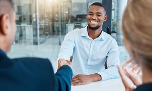 Do you shake hands at an interview?