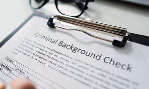 Who pays for police check employer or employee?